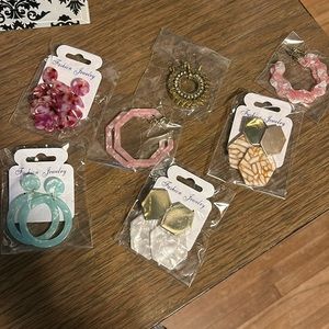 Assortment of never used earrings acrylic and metal pink green white brown